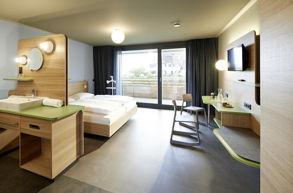 Hotel Mein Inselglueck ไรเชอเนา ห้อง รูปภาพ