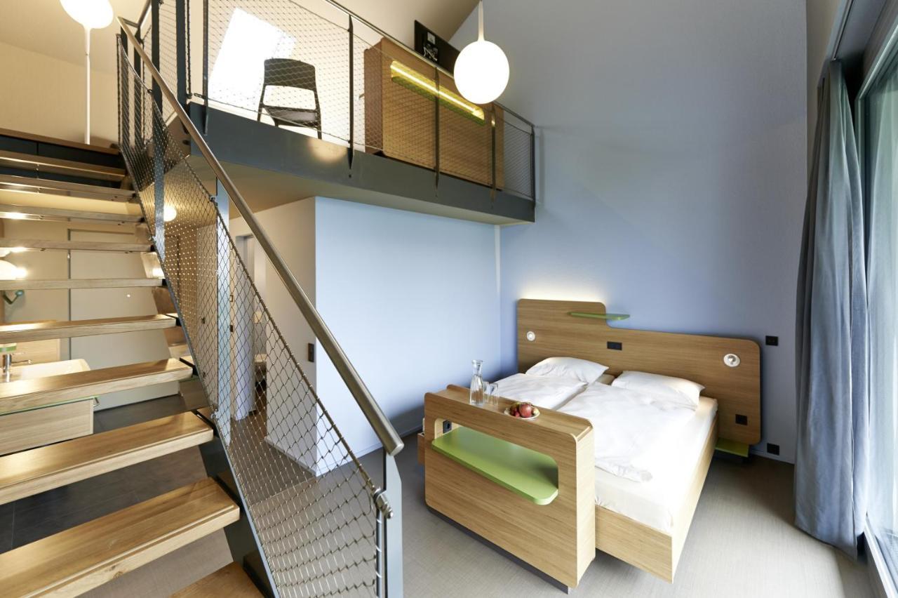Hotel Mein Inselglueck ไรเชอเนา ภายนอก รูปภาพ